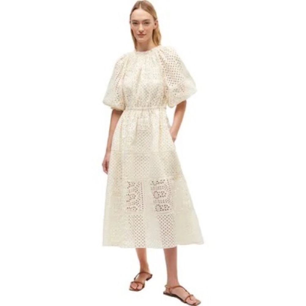 Brand new with tags and never worn. Rhode Amara Dress in size large.